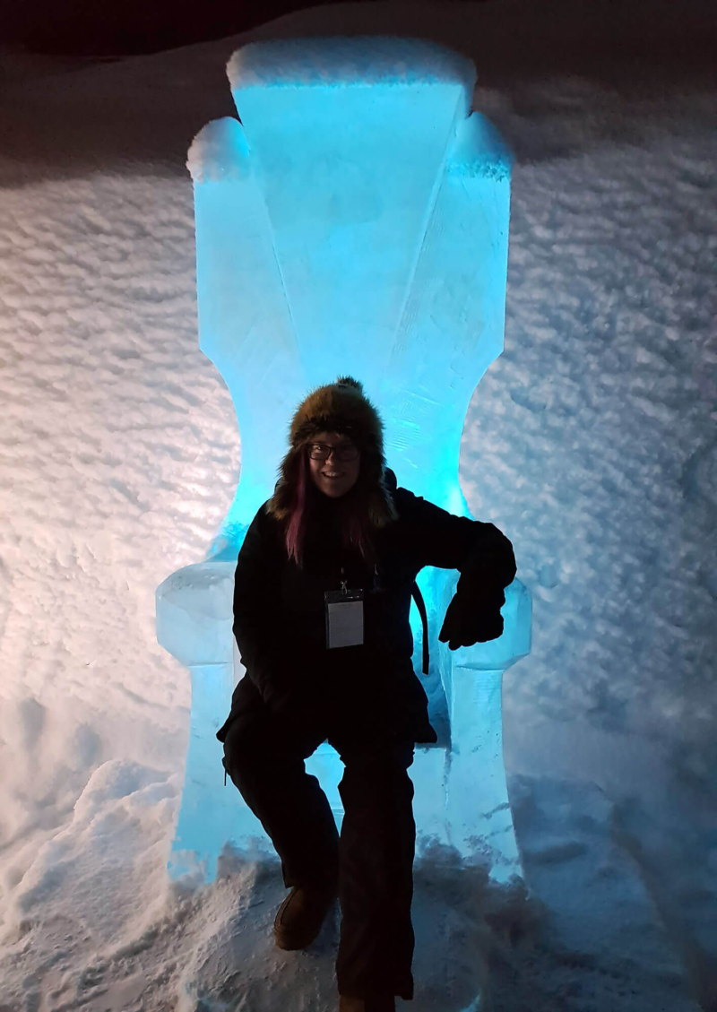 Me sitting on a throne of ice outside Icehotel